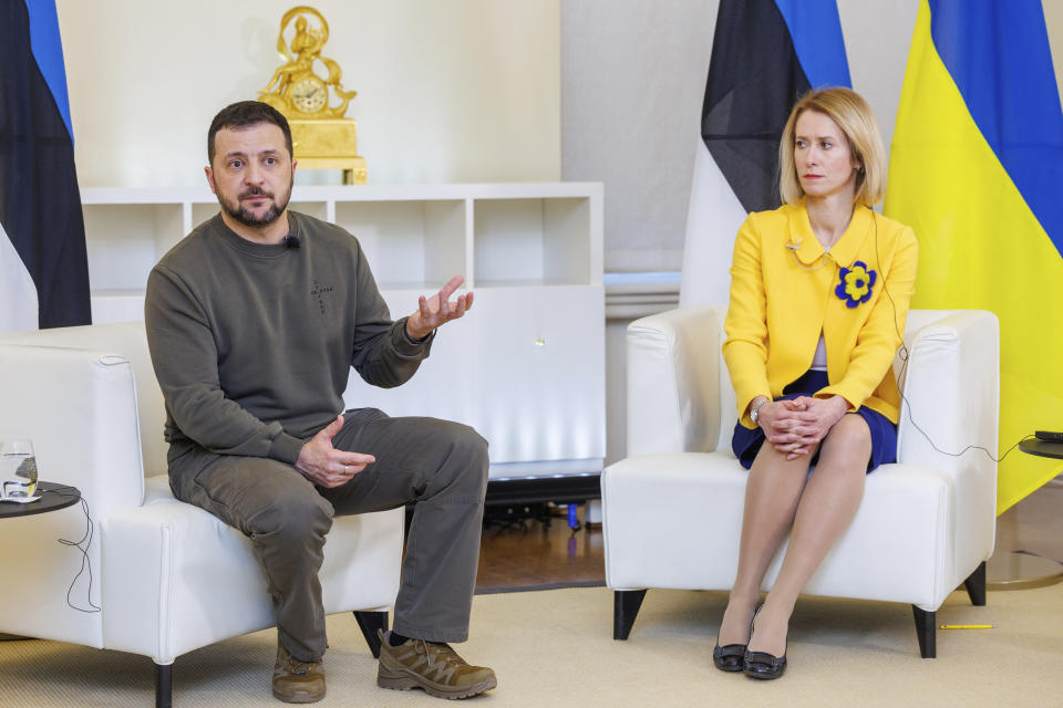 FILE - Estonia's Prime Minister Kaja Kallas, right, and Ukrainian President Volodymyr Zelenskyy attend a joint news conference in Stenbock House, Tallinn, Estonia, Jan.11, 2024. Russia has put Estonian Prime Minister Kaja Kallas on a wanted list, an official register showed Tuesday, Feb. 13, 2024, a move that comes amid soaring Russia-West tensions over Ukraine. (AP Photo)