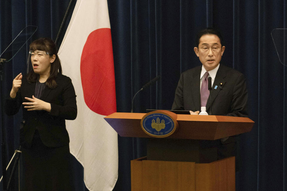 Japanese Prime Minister Fumio Kishida speaks during a news conference in Tokyo, Wednesday, March 16, 2022. Kishida on Wednesday announced plans to fully lift coronavirus restrictions on March 21 as new infections driven by the highly contagious omicron variant slow. (Stanislav Kogiku/Pool Photo via AP)