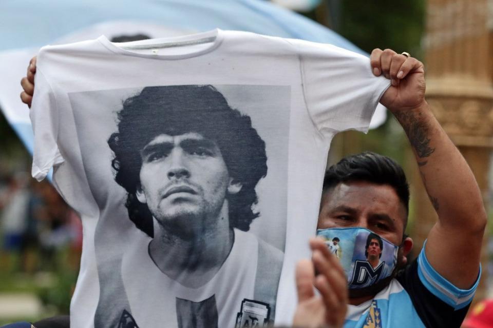 Fans waited to enter Government House in Buenos Aires to pay tributeAFP via Getty Images