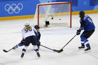 <p>Dani Cameranesi, of the United States, shoots a goal against Finland during the third period of the preliminary round of the women’s hockey game at the 2018 Winter Olympics in Gangneung, South Korea, Sunday, Feb. 11, 2018. (AP Photo/Frank Franklin II) </p>