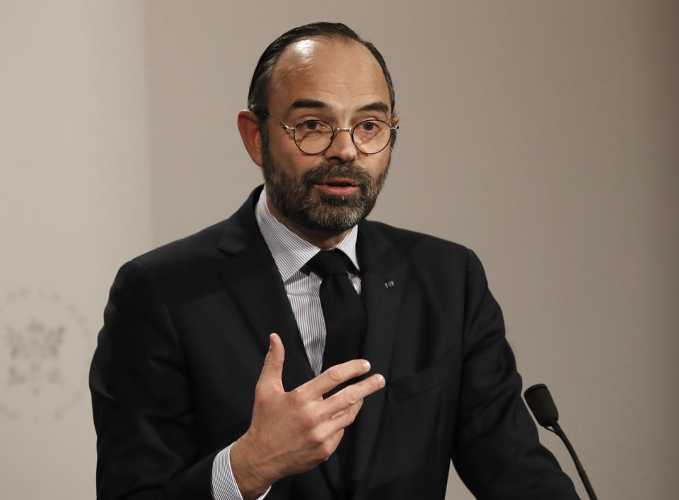 French Prime Minister Edouard Philippe delivers his speech during a press conference in Paris, Wednesday, Jan. 9, 2019. French President Emmanuel Macron is facing a mountain of challenges in the new year starting with yellow vest protesters who are back in the streets to show their anger against high taxes and his pro-business policies that they see as favoring the wealthy rather than the working class. (AP Photo/Christophe Ena, Pool)