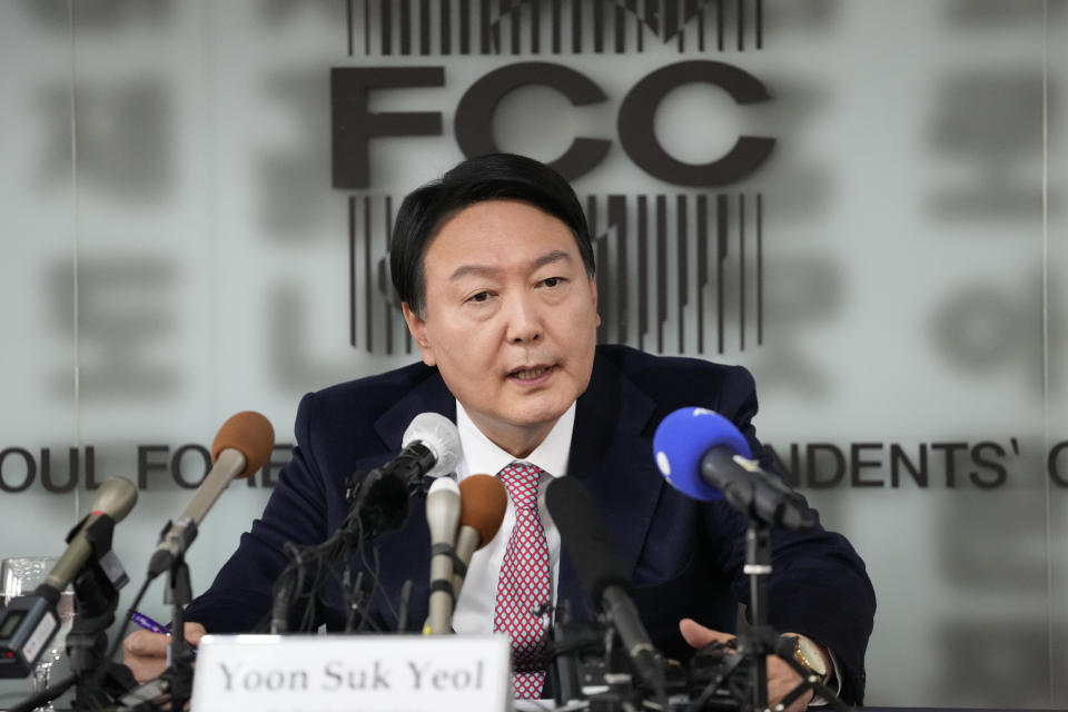 Yoon Suk Yeol, a candidate of the main opposition People Power Party for next March's presidential election answers a reporter's question during a meeting with the members of foreign media in Seoul, South Korea, Friday, Nov. 12, 2021. Yoon, South Korea’s main opposition presidential candidate said Friday he will strengthen military cooperation with the United States and Japan if elected to better cope with North Korea's nuclear threat and would strive to make the North a leading foreign policy priority for the U.S. (AP Photo/Lee Jin-man)