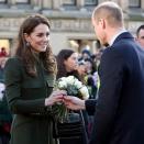 <p>Moments before the royal couple left City Hall in Bradford, the Duke of Cambridge took the chance to give his wife a white rose, January 2020. </p>