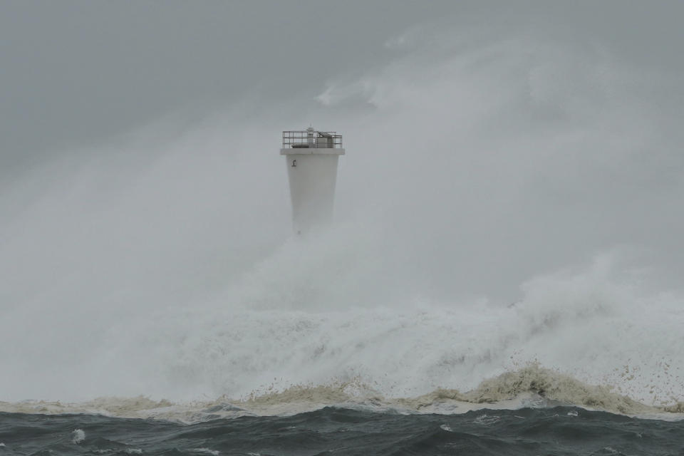 Surging waves hit against the breakwater and a lighthouse as Typhoon Hagibis approaches at a port in town of Kiho, Mie prefecture, central Japan, Oct. 12, 2019. Tokyo and surrounding areas braced for a powerful typhoon forecast as the worst in six decades, with streets and trains stations unusually quiet Saturday as rain poured over the city. (Photo: Toru Hanai/AP)