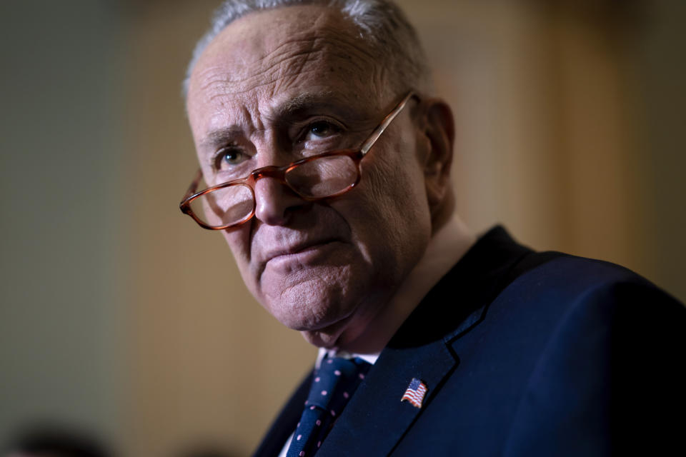 Senate Majority Leader Chuck Schumer, D-N.Y., meets with reporters asking about President Joe Biden's proposed $5.8 trillion budget, at the Capitol in Washington, Tuesday, March 29, 2022. (AP Photo/J. Scott Applewhite)