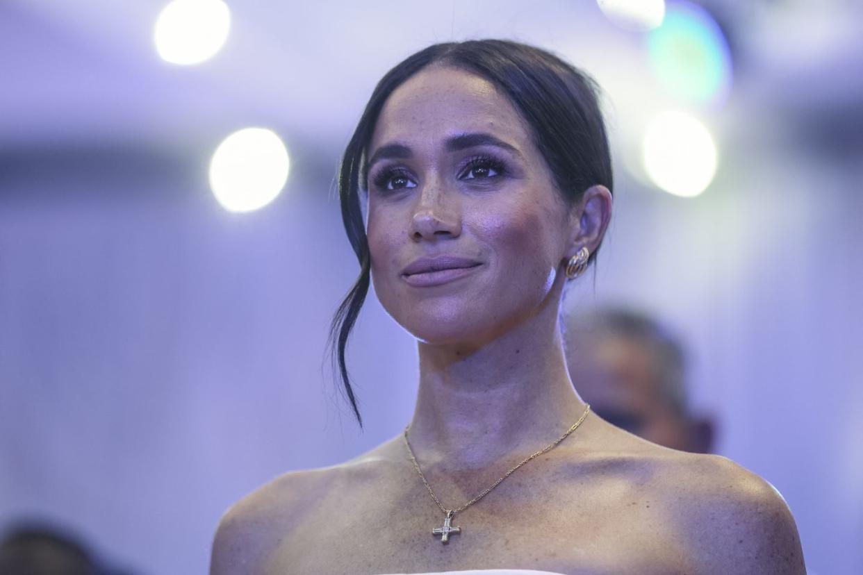 topshot britains meghan, duchess of sussex, looks on as she attends a sit out with britains prince harry unseen, duke of sussex, at the nigerian defence headquarters in abuja on may 11, 2024 as they visit nigeria as part of celebrations of invictus games anniversary photo by kola sulaimon afp photo by kola sulaimonafp via getty images