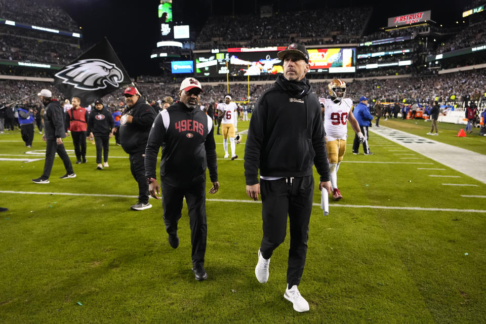 San Francisco 49ers head coach Kyle Shanahan walks off the field after the NFC championship loss to the Philadelphia Eagles. It's the second straight season the 49ers have fallen one victory short of making the Super Bowl. (AP Photo/Matt Rourke)