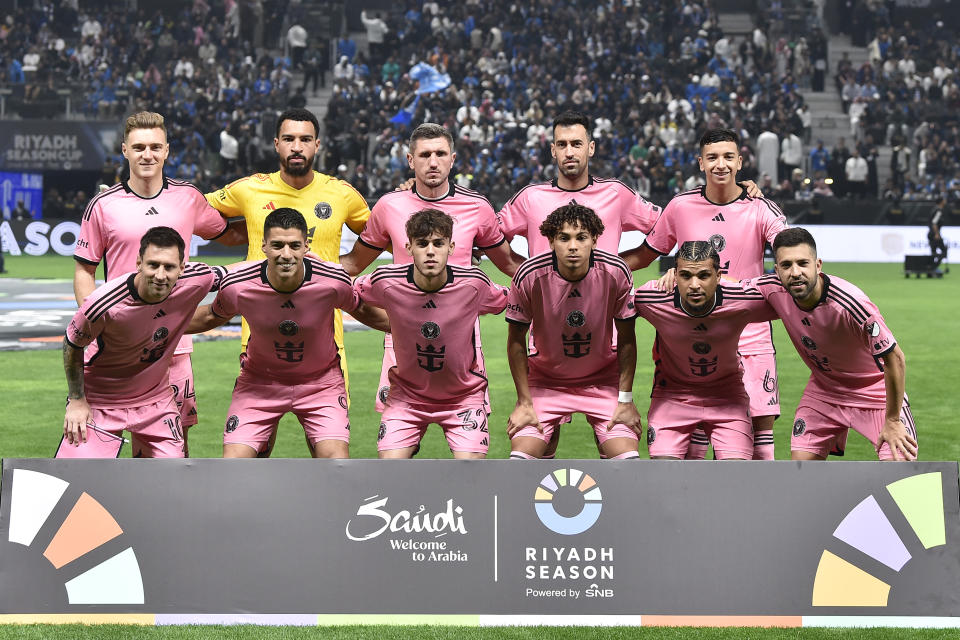 Inter Miami's players pose for a group picture during the Riyadh Season Cup soccer match between Inter Miami and Al Hilal at Kingdom Arena Stadium in Riyadh, Saudi Arabia, Monday, Jan. 29, 2024. (AP Photo)