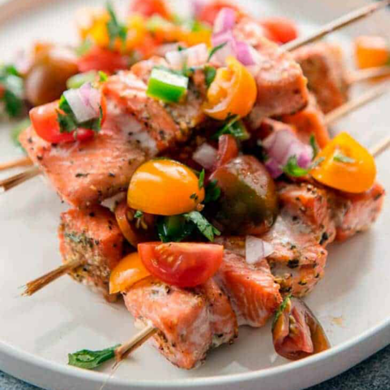 <p>Appetite For Energy</p><p>Keto Grilled Salmon Kabobs with fresh tomato salsa! Make this vibrant family favorite in 30 minutes!</p><p><strong>Get the recipe: <a href="https://www.appetiteforenergy.com/grilled-salmon-kabobs-recipe/" rel="nofollow noopener" target="_blank" data-ylk="slk:Keto Grilled Salmon Kabobs Recipe;elm:context_link;itc:0;sec:content-canvas" class="link rapid-noclick-resp">Keto Grilled Salmon Kabobs Recipe</a></strong></p>