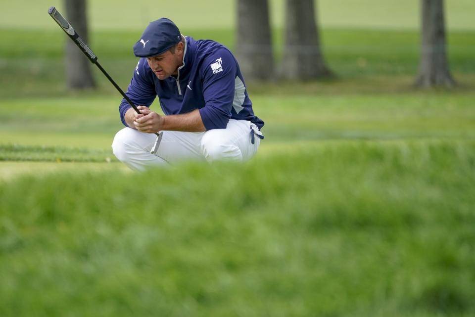 Bryson DeChambeau lines up a putt on the second green during the second round of the U.S. Open on Thursday.