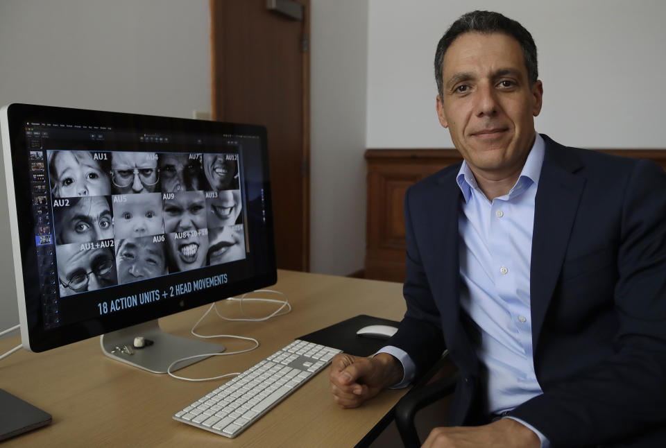 In this Monday, July 1, 2019, photo Hany Farid, a digital forensics expert at the University of California at Berkeley, poses for a photo while taking a break from viewing video clips in his office in Berkeley, Calif. Sophisticated phony videos called deepfakes have attracted attention as a possible threat to election integrity. But a bigger problem for the 2020 U.S. presidential contest may be “dumbfakes.” The fact that these videos are made so easily and then widely shared across social media platforms does not bode well for 2020, said Farid. (AP Photo/Ben Margot)