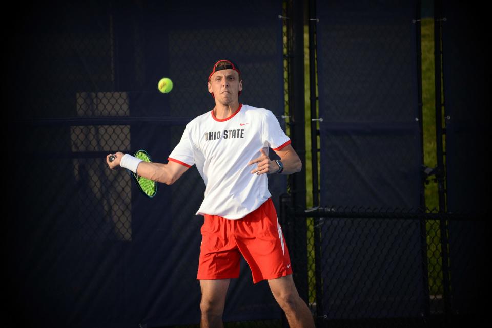 Andrew Lutchaunig clinched a quarterfinal win over Michigan to send No. 4 Ohio State into Saturday's semifinal against No. 8 Kentucky.