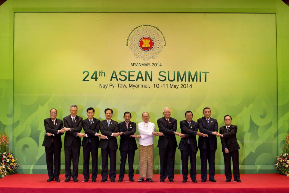 CORRECTS LEADERS' ID OF LAOS AND THAILAND - Leaders of the Association of Southeast Asian Nations pose for a photograph during the 24th ASEAN leaders Summit in Naypyitaw, Myanmar, Sunday, May 11 2014. Leaders from left are, Philippine President Benigno Aquino III, Singaporean Prime Minister Lee Hsien Loong, Thailand's Deputy Prime Minister Pongthep Thepkanjana, Vietnamese President Truong Tan Sang, Sultan of Brunei Hassanal Bolkiah, Myanmar President Thein Sein, Malaysian Prime Minister Najib Razak, Cambodian Prime Minister Hun Sen, Indonesian President Susilo Bambang Yudhoyono, and Laos Prime Minister Thongsing Thammavong. (AP Photo/Gemunu Amarasinghe)