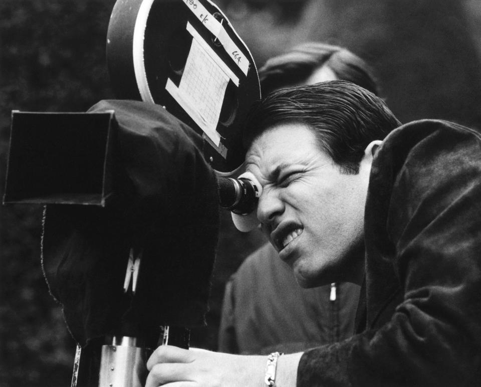 Steve Binder, seen checking a camera angle during the filming of Elvis Presley's 1968 TV special, grew close to the star during the five-month project, but afterward, they never spoke again. Binder says Colonel Tom Parker was fearful of their friendship.