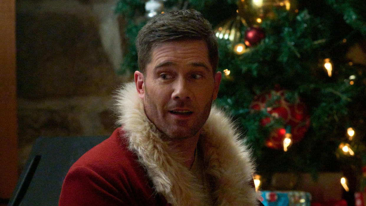  Luke Macfarlane as Chris in Hallmark's Catch Me If You Claus. 