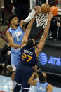 Houston Rockets forward Kenyon Martin Jr. (6) blocks the basket attempt by Utah Jazz center Rudy Gobert (27) during the first half of an NBA basketball game Wednesday, April 21, 2021, in Houston. (AP Photo/Michael Wyke, Pool)