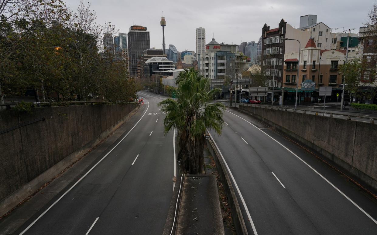 A usually busy thoroughfare seen devoid of cars during a lockdown to curb the spread of a coronavirus outbreak in Sydney - Reuters