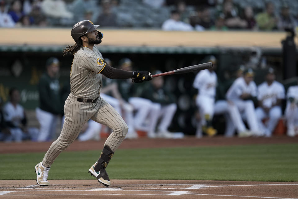 San Diego Padres' Fernando Tatis Jr. watches his solo home run against the Oakland Athletics during the first inning of a baseball game Friday, Sept. 15, 2023, in Oakland, Calif. (AP Photo/Godofredo A. Vásquez)