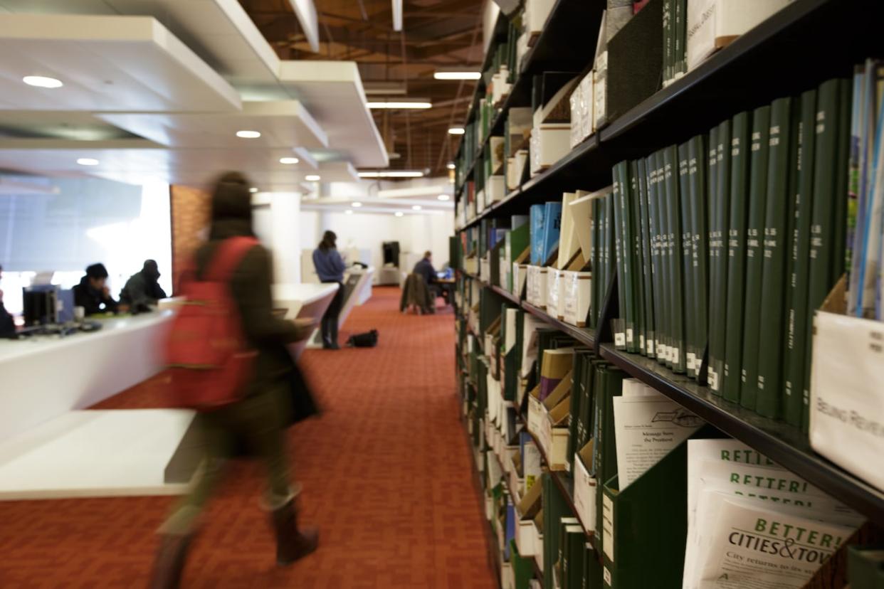 The Toronto Public Library (TPL) says it's the busiest urban public library in the world. But one million of its books have been in limbo after a crippling cyberattack late last year. The library and its 100 branches are only now recovering, (Katherine Holland/CBC - image credit)