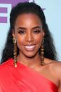 <p>Kelly Rowland wears her hair in a half-up, half-down look with the top loosely pulled back. </p>