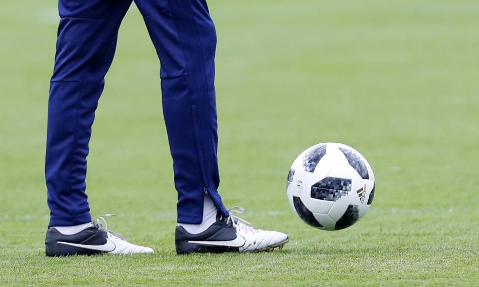 Iran’s head coach Carlos Queiroz is pictured wearing Nike boots in a training session in Russia.