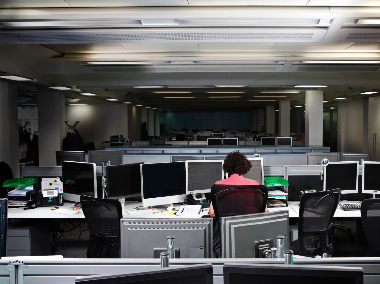 A business woman working late