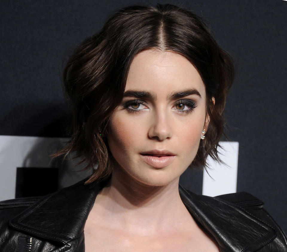 <p>The actress, known for her bold brows, rocked a wob, smoky eyeshadow, and pale lips with her Saint Laurent moto jacket. <i>(Photo: Getty Images)</i></p>