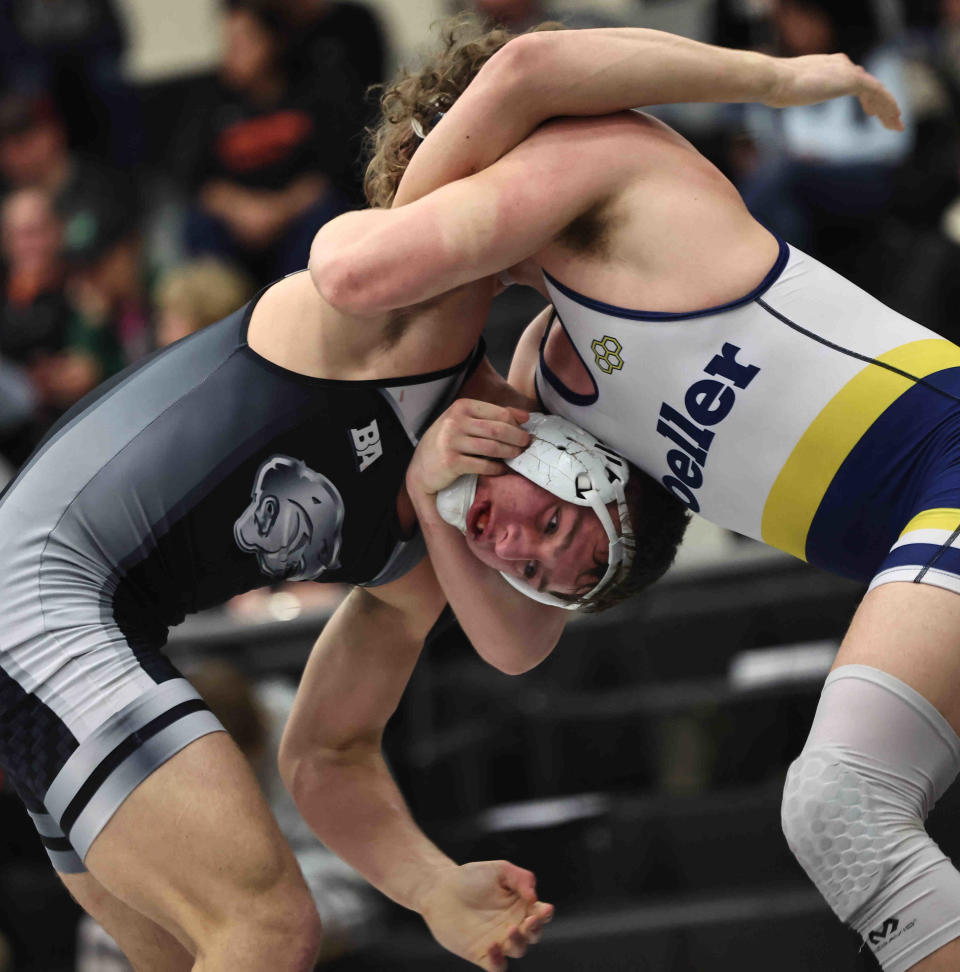 Springboro's Aidan Weimer and Moeller's Will Adkins battle in a sectional final in 2023.