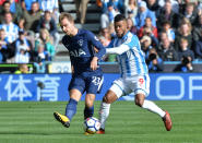 <p>Tottenham’s Christian Eriksen in action with Huddersfield Town’s Elias Kachunga (REUTERS/Peter Powell) </p>