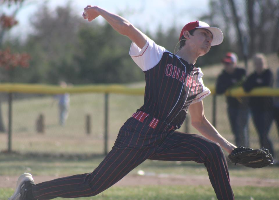 Onaway senior Cole Selke fires a pitch during game one at Inland Lakes on Tuesday.