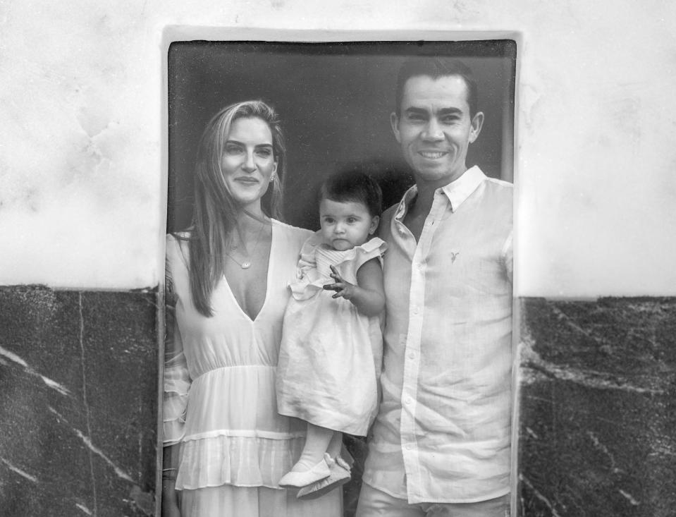 A photograph of Maria and Camilo Villegas with their daughter, Mia, who died from brain cancer in 2021. In her honor, they created Mia's Miracles to provide support to children and families facing challenging circumstances.
