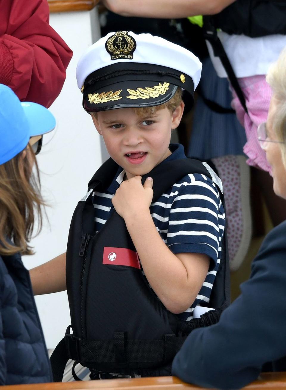 <p>In August, the Cambridges attended the King's Cup regatta, and Prince Charles showed off his new gap-toothed smile while watching the race.</p>