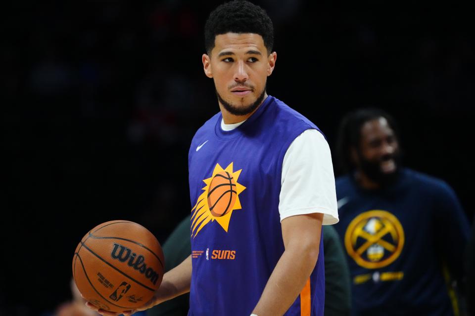 Oct 10, 2022; Denver, Colorado, USA; Phoenix Suns guard Devin Booker (1) before the preseason game against the Denver Nuggets at Ball Arena.