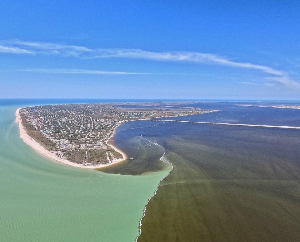 This aerial image shows freshwater from Lake Okeechobee combined with runoff from the Caloosahatcheer River's watershed. The U.S. Army Corps of Engineers started large-volume releases from Lake Okeechobee earlier this week.