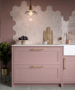 <p> If you know your love of pink is going to stick around for a while (and that you&apos;re not going anywhere fast either), why not choose pink kitchen cabinets? We are in love with this kitchen from Naked Kitchens, the combination of the pink and deep purple cabinets is beautiful, and the light wood-paneled walls? Dreamy. </p> <p> If you are doing up your kitchen on a budget, you could always paint kitchen cabinets pink yourself.&#xA0; </p> <p> &apos;Pink&#xA0;is actually a versatile color for the kitchen, pair with soft cream cabinets for a romantic regency-core style or fuse with rich coppers and dark greens for a fresh, vibrant space,&apos; says Yvonne Keal, senior product manager at&#xA0;Hillary&apos;s. </p>