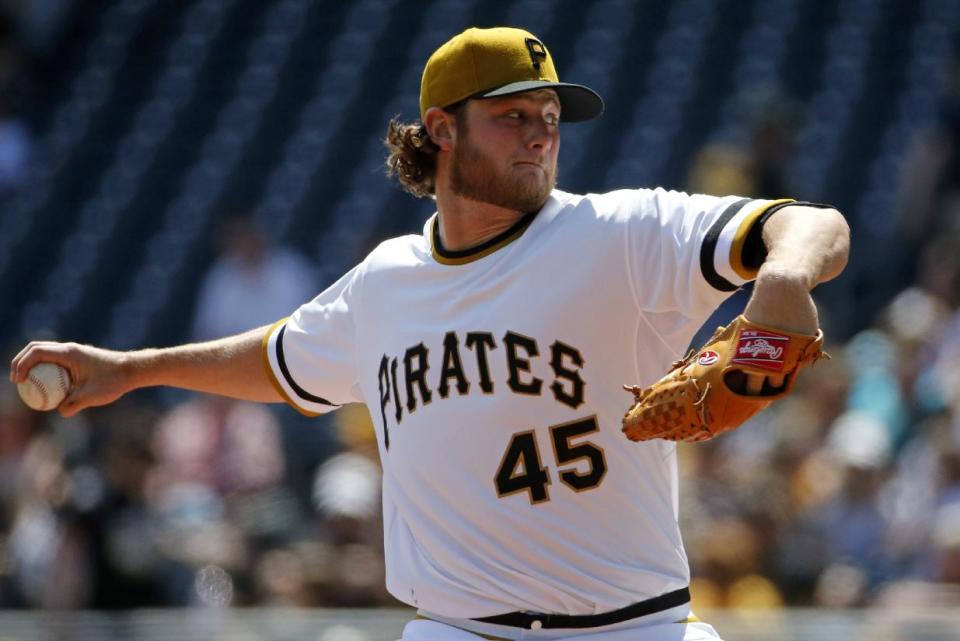 Pittsburgh Pirates starting pitcher Gerrit Cole delivers during the second inning of a baseball game against the Milwaukee Brewers in Pittsburgh, Sunday, April 20, 2014. (AP Photo/Gene J. Puskar)