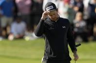 Mito Pereira, of Chile, leaves the green on the 18th hole after his final round of the PGA Championship golf tournament at Southern Hills Country Club, Sunday, May 22, 2022, in Tulsa, Okla. (AP Photo/Matt York)