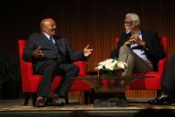 Football Hall of Famer Jim Brown, left, and Basketball Hall of Famer Bill Russell take part in the "Sports and Race: Leveling the Playing Field" panel during the Civil Rights Summit on Wednesday, April 9, 2014, in Austin, Texas. Brown and Russell discussed using their platforms in their respective sports to raise awareness for civil rights. (AP Photo/Jack Plunkett)