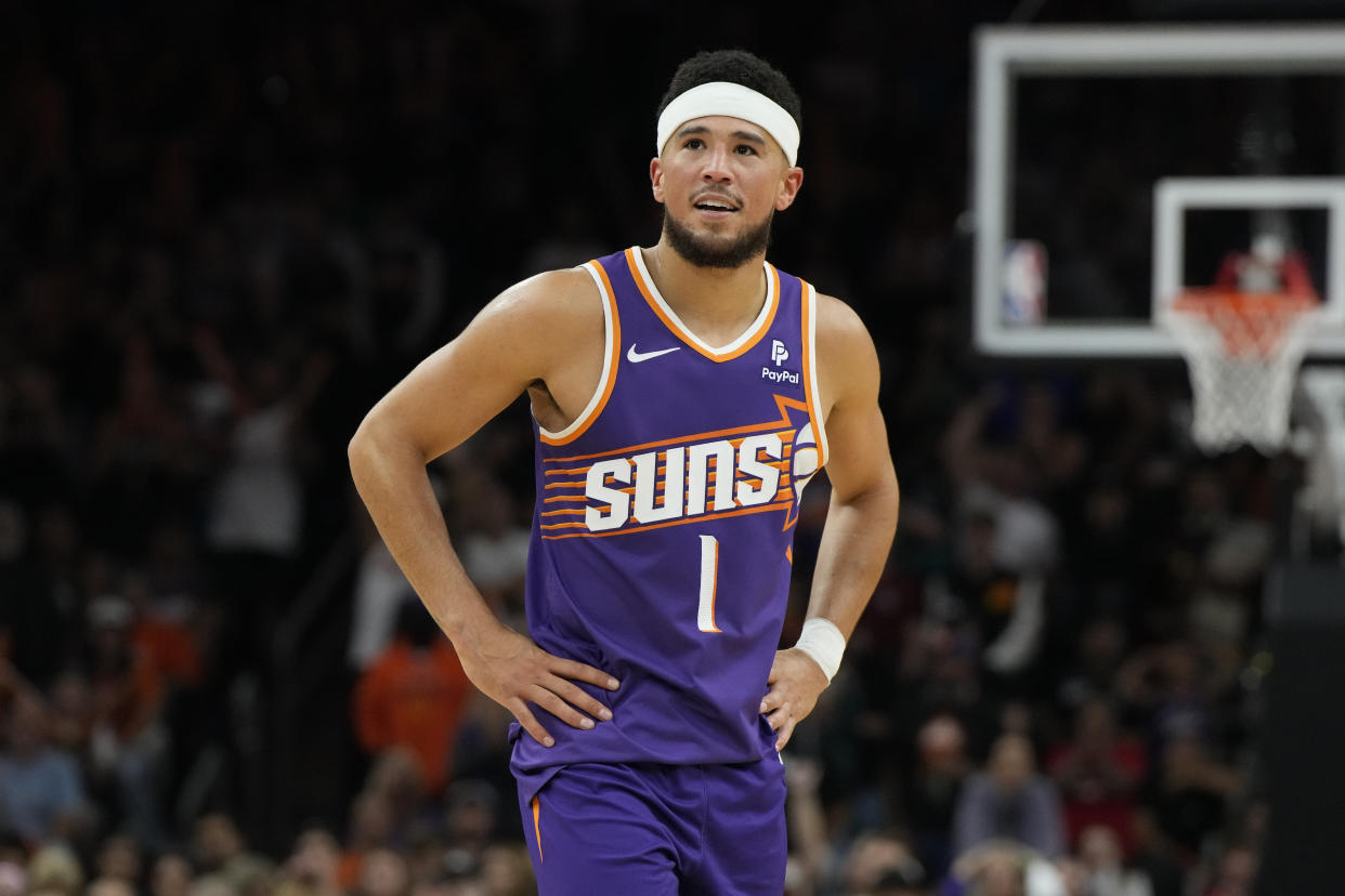 Fantasy basketball managers are getting some troubling signals from Devin Booker early on. (AP Photo/Rick Scuteri)