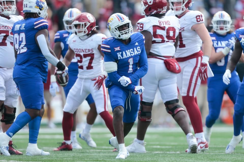 Kansas safety Kenny Logan Jr. (1) reacts after making a tackle against Oklahoma in the first quarter of their game at David Booth Kansas Memorial Stadium.