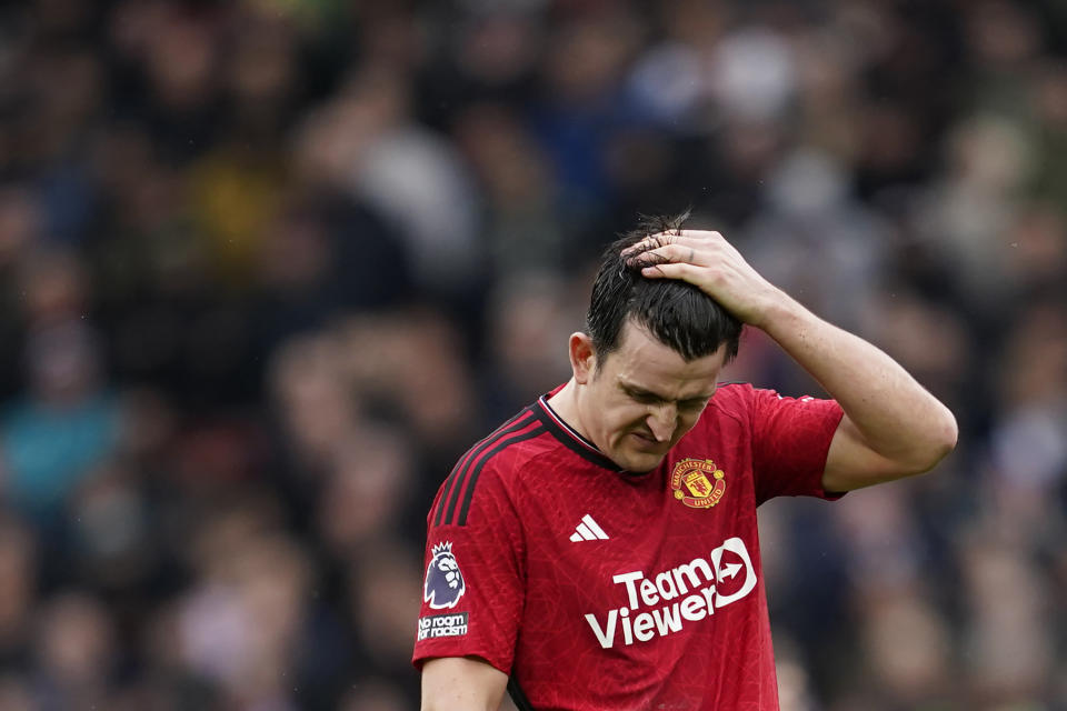 Manchester United's Harry Maguire reacts during the English Premier League soccer match between Manchester United and Liverpool at the Old Trafford stadium in Manchester, England, Sunday, April 7, 2024. (AP Photo/Dave Thompson)