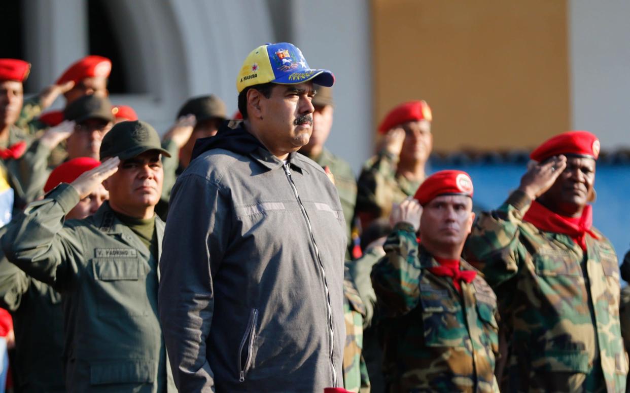 President Nicolas Maduro is facing mounting pressure to stand aside - AFP