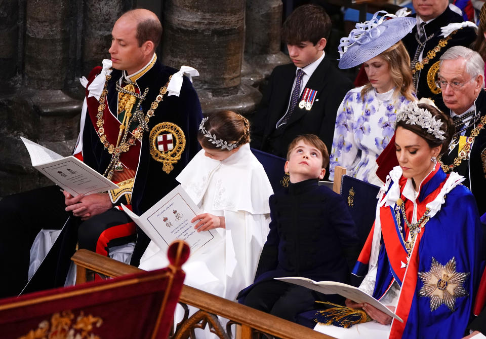 LONDON, ENGLAND - MAY 06: Britain's Prince William, Prince of Wales, Princess Charlotte, Prince Louis and Britain's Catherine, Princess of Wales attend the Coronation of King Charles III and Queen Camilla at Westminster Abbey on May 6, 2023 in London, England. The Coronation of Charles III and his wife, Camilla, as King and Queen of the United Kingdom of Great Britain and Northern Ireland, and the other Commonwealth realms takes place at Westminster Abbey today. Charles acceded to the throne on 8 September 2022, upon the death of his mother, Elizabeth II. (Photo by Yui Mok  - WPA Pool/Getty Images)