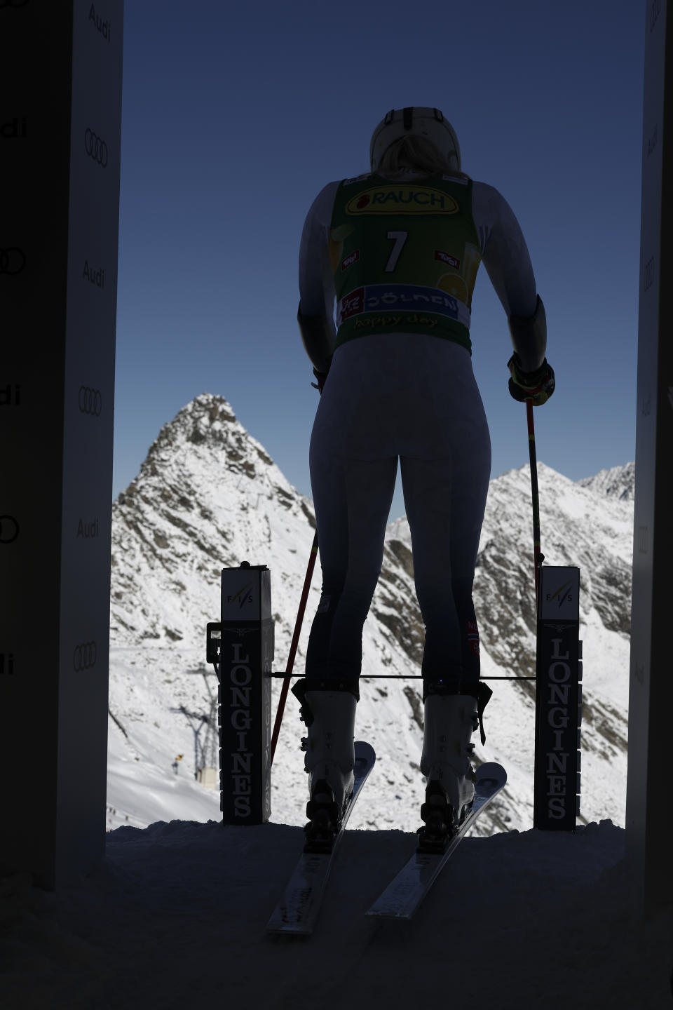 Norway's Ragnhild Mowinckel is silhouetted at the start of the first run of an alpine ski, women's World Cup giant slalom race, in Soelden, Austria, Saturday, Oct. 28, 2023. (AP Photo/Gabriele Facciotti)