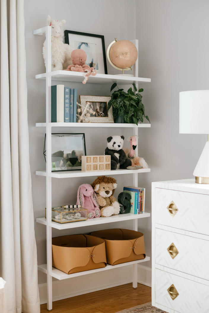 <p> When space is short in a room, it&apos;s vital to create storage that takes up little room but maxes out the toy storage possibilities. With handsome-looking toys, you can use open shelving to display as well as stash. </p> <p> &apos;Wall mounted ladder style storage is fabulous for kids&apos; rooms, especially those that are on the small size as they take up less space. Vertical storage is key and this fits into a small corner space perfectly. Use the shelves for a mixture of toys and books,&apos; says Jennifer Ebert, digital editor, <em>Homes &amp; Gardens.</em> </p>