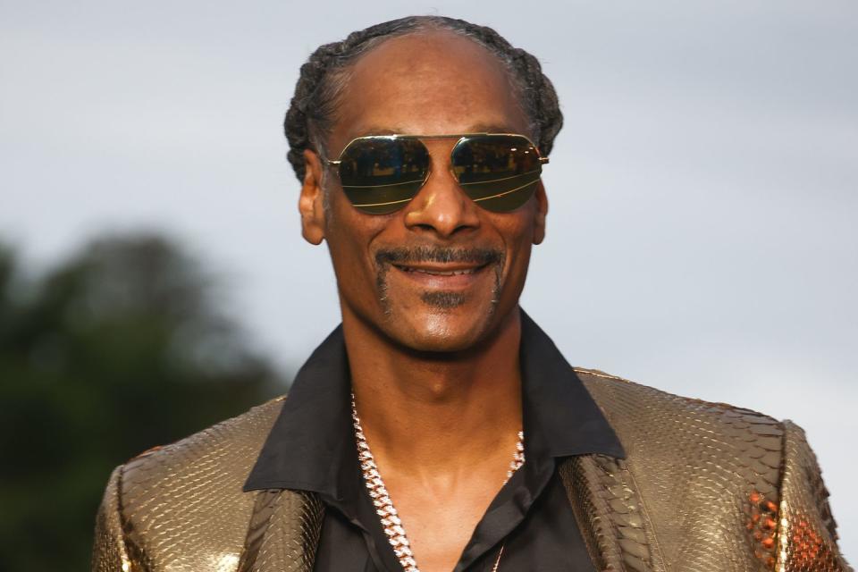 <p>Marc Piasecki/WireImage</p> Snoop Dogg in July 2024