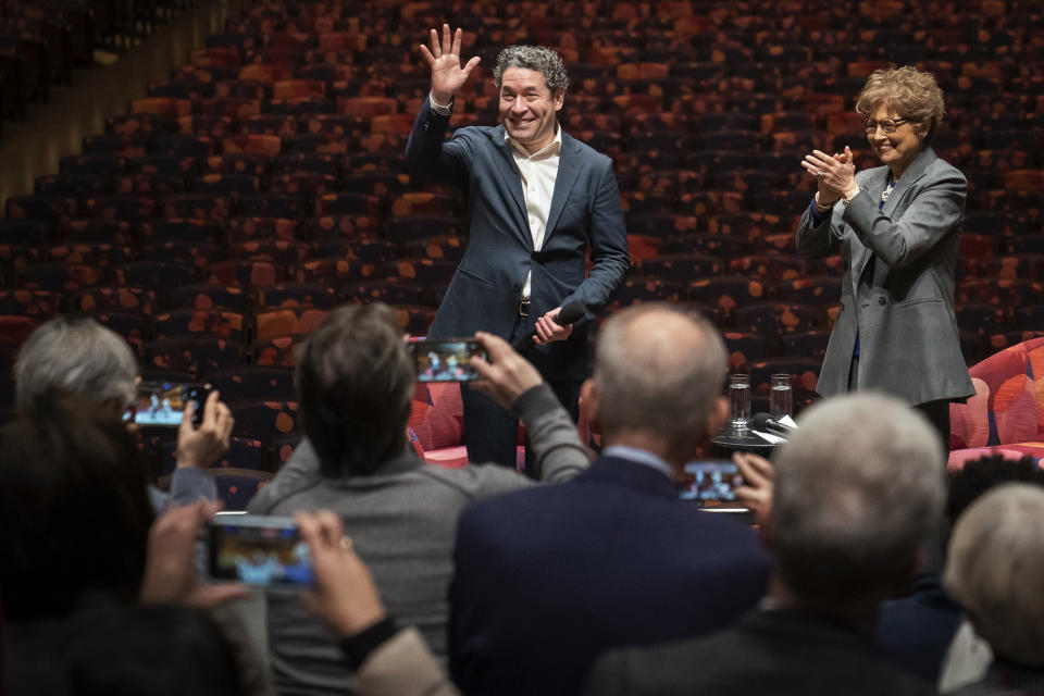 FILE - Gustavo Dudamel is introduced as the New York Philharmonic's 27th music and artistic director, Monday, Feb. 20, 2023, in the newly renovated David Geffen Hall at Lincoln Center for the Performing Arts in New York. On Friday, May 19, 2023, Dudamel and the New York Philharmonic received a seven-minute standing ovation following his first performance with the orchestra since he agreed to become music director. (AP Photo/John Minchillo, File)