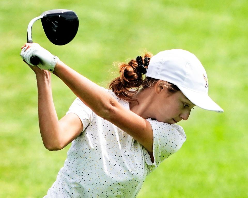 Barrington's Lily Dessel hits off the 14th tee on Tuesday in Warwick. She finished second with a 6-over 78.