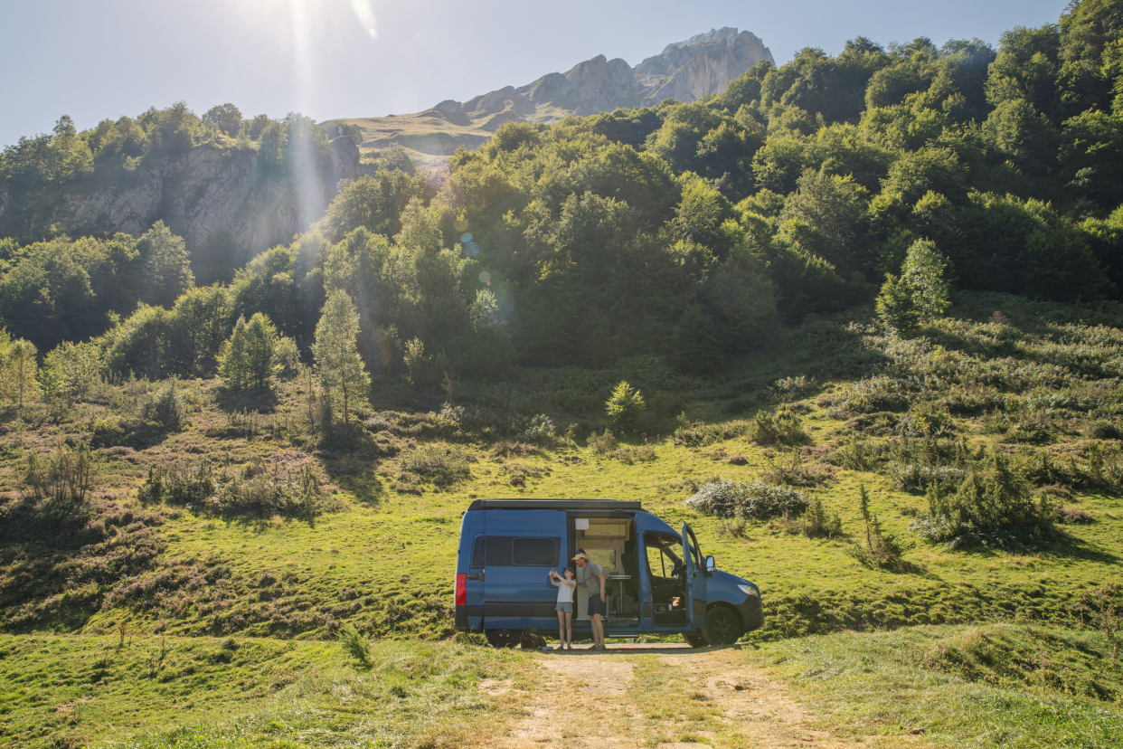 RV Parked With a Girl and Her Father in a Mountain Pass in the French Pyrenees Mountains