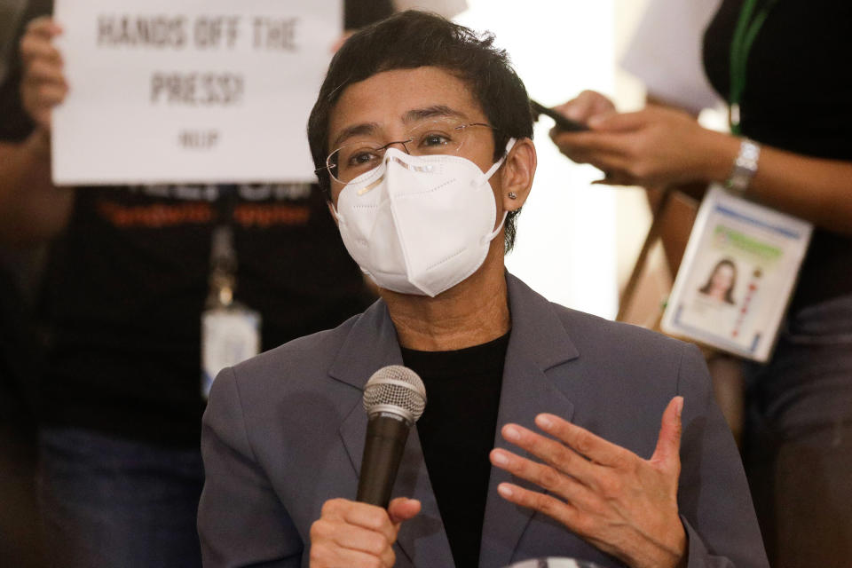 Rappler CEO and Executive Editor Maria Ressa gestures during a press conference near the Manila Regional Trial Court in Manila, Philippines on Monday June 15, 2020. Ressa, an award-winning journalist critical of the Philippine president, was convicted of libel and sentenced to jail Monday in a decision called a major blow to press freedom in an Asian bastion of democracy. (AP Photo/Aaron Favila)